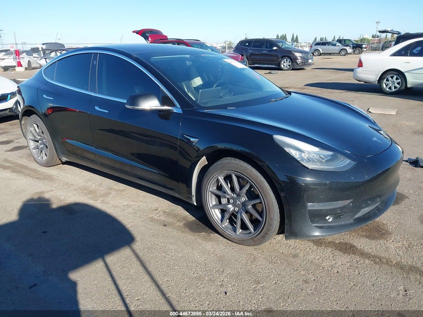 2018 Tesla Model 3 VIN 5YJ3E1EBXJF103198 IAAI salvage auction — LEFT SIDE, Regular (Nevada), sold $5,400 on 2026-07-09 (photo 1)