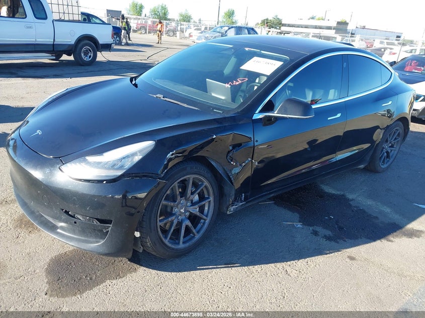 2018 Tesla Model 3 VIN 5YJ3E1EBXJF103198 IAAI salvage auction — LEFT SIDE, Regular (Nevada), sold $5,400 on 2026-07-09 (photo 2)