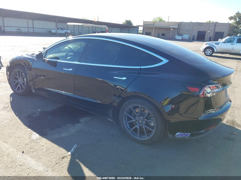 2018 Tesla Model 3 VIN 5YJ3E1EBXJF103198 IAAI salvage auction — LEFT SIDE, Regular (Nevada), sold $5,400 on 2026-07-09 (photo 3)