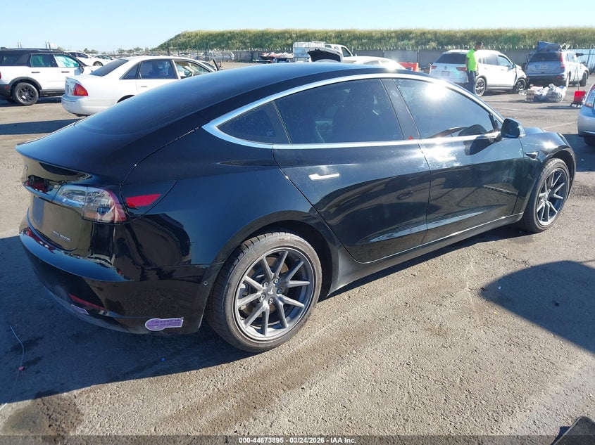 2018 Tesla Model 3 VIN 5YJ3E1EBXJF103198 IAAI salvage auction — LEFT SIDE, Regular (Nevada), sold $5,400 on 2026-07-09 (photo 4)