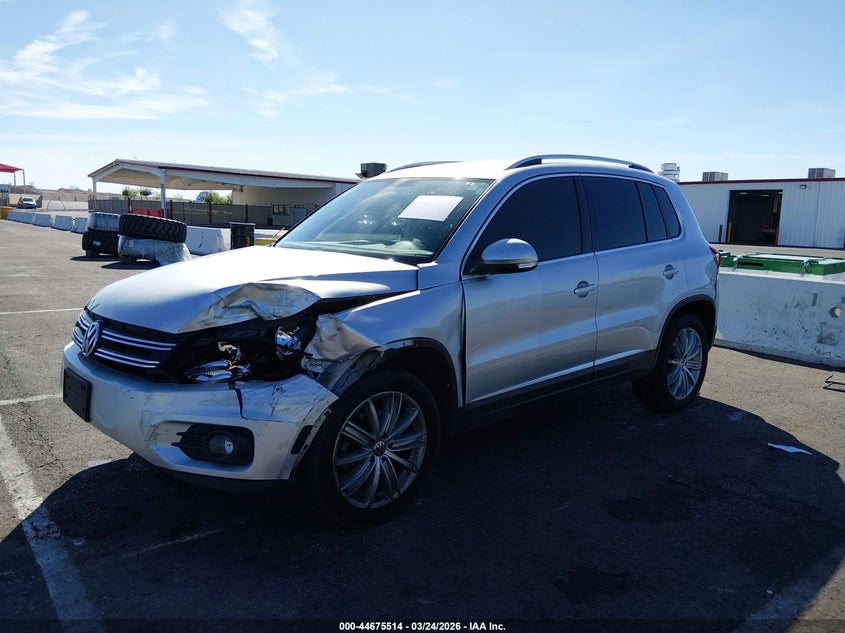 2014 Volkswagen Tiguan VIN WVGAV3AXXEW599640 IAAI salvage auction — LEFT FRONT, Wait Title, sold $1,150 on 2026-08-14 (photo 2)