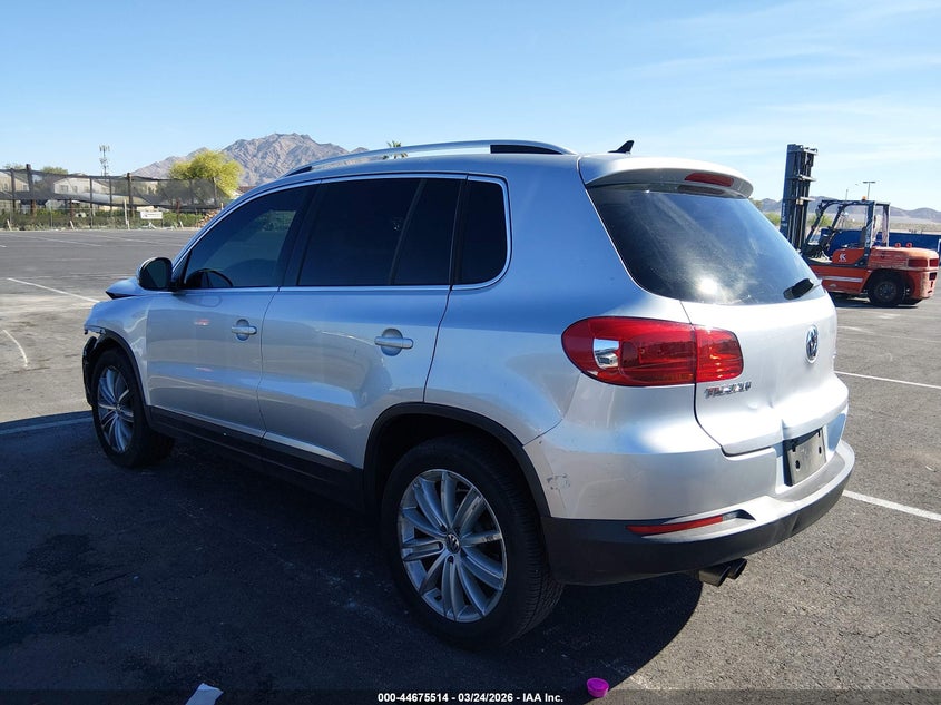 2014 Volkswagen Tiguan VIN WVGAV3AXXEW599640 IAAI salvage auction — LEFT FRONT, Wait Title, sold $1,150 on 2026-08-14 (photo 3)