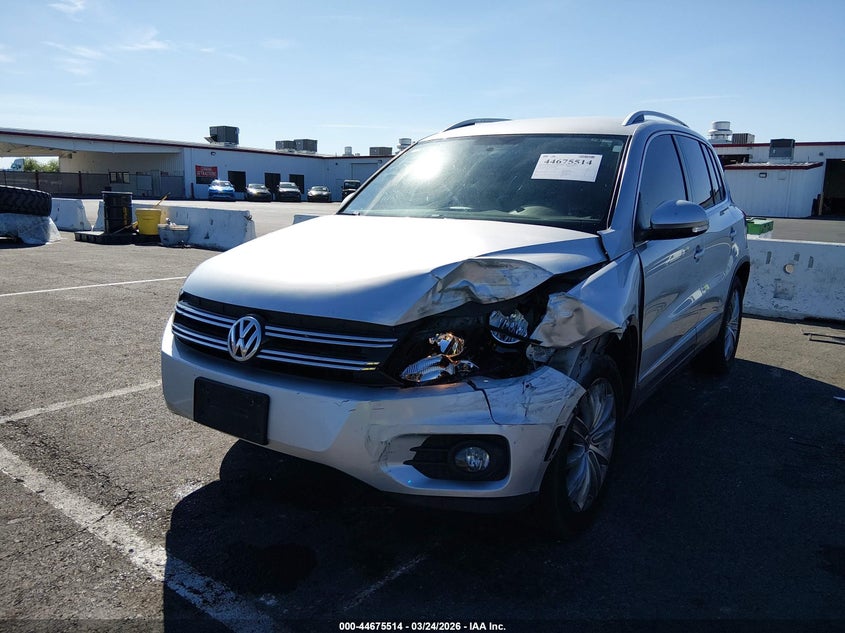 2014 Volkswagen Tiguan VIN WVGAV3AXXEW599640 IAAI salvage auction — LEFT FRONT, Wait Title, sold $1,150 on 2026-08-14 (photo 6)