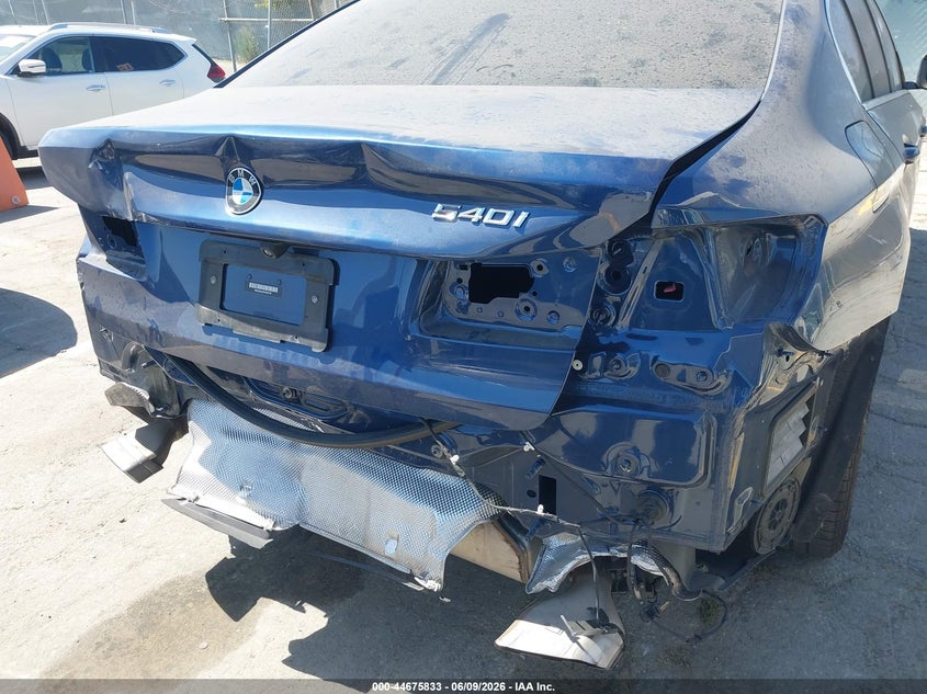 2023 BMW 5er VIN WBA53BJ03PWX99767 IAAI salvage auction — REAR END, Wait Title, sold $22,600 on 2026-08-12 (photo 6)