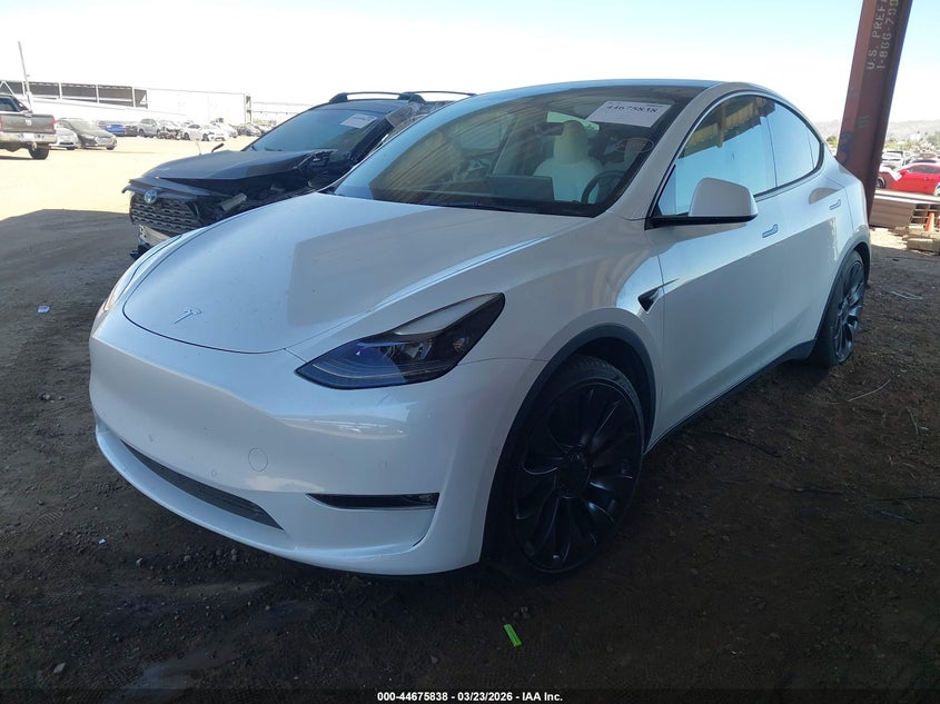 2021 Tesla Model y VIN 5YJYGDEF1MF209399 IAAI salvage auction — UNKNOWN, Salvage Title, sold $18,200 on 2026-07-21 (photo 2)