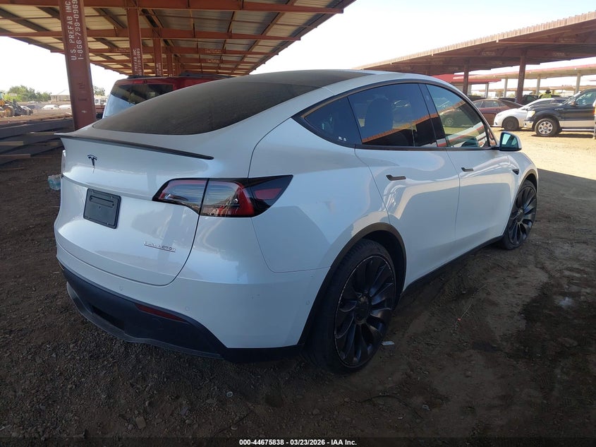 2021 Tesla Model y VIN 5YJYGDEF1MF209399 IAAI salvage auction — UNKNOWN, Salvage Title, sold $18,200 on 2026-07-21 (photo 4)