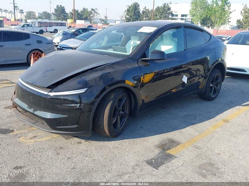 2026 Tesla Model y VIN 7SAYGDED1TF585102 IAAI salvage auction — RIGHT FRONT, Salvage (California), sold $12,175 on 2026-07-14 (photo 2)