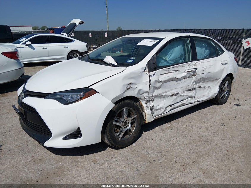 2017 Toyota Corolla VIN 5YFBURHE5HP611676 IAAI salvage auction — LEFT SIDE, Wait Title, sold $1,100 on 2026-07-28 (photo 2)