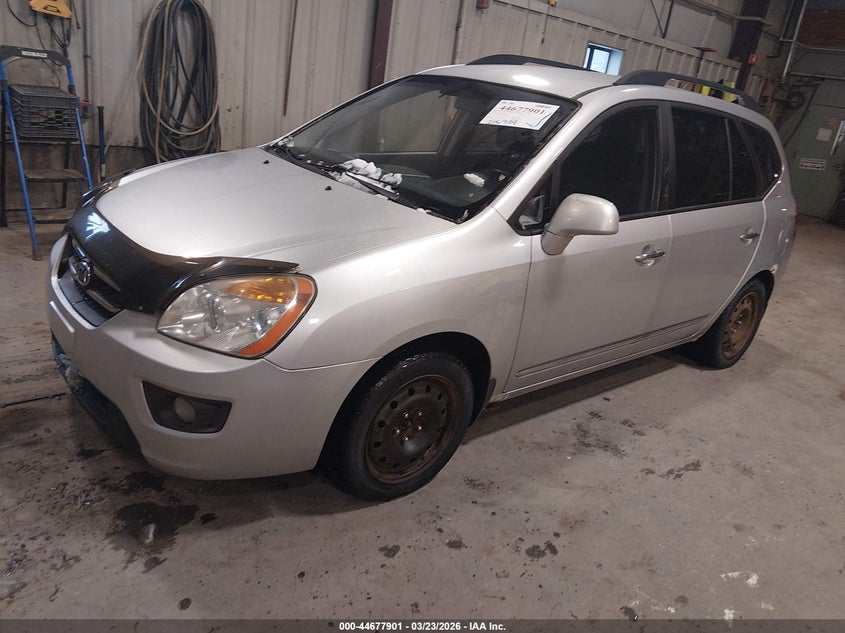 2010 Kia Rondo VIN KNAHH8A84A7305067 IAAI salvage auction — SIDE, Non-Usa Canadian (Vermont), sold $125 on 2026-07-23 (photo 2)
