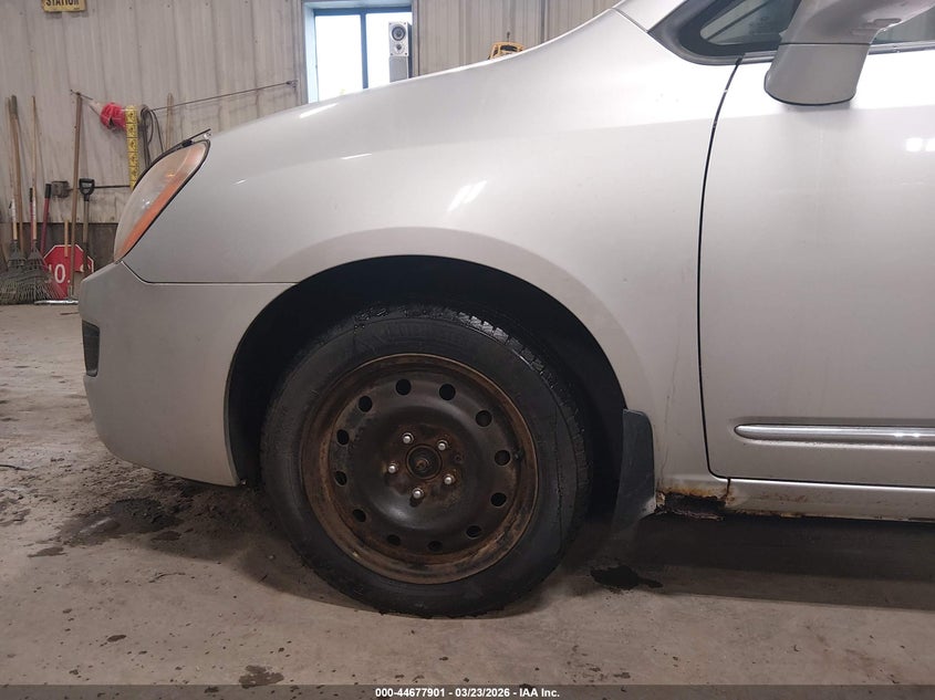 2010 Kia Rondo VIN KNAHH8A84A7305067 IAAI salvage auction — SIDE, Non-Usa Canadian (Vermont), sold $125 on 2026-07-23 (photo 6)