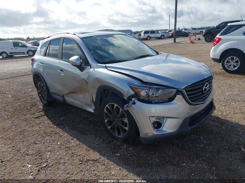 2016 Mazda Cx-5 VIN JM3KE2DY5G0669047 IAAI salvage auction — RIGHT SIDE, Original (Texas), sold $3,700 on 2026-07-15 (photo 1)