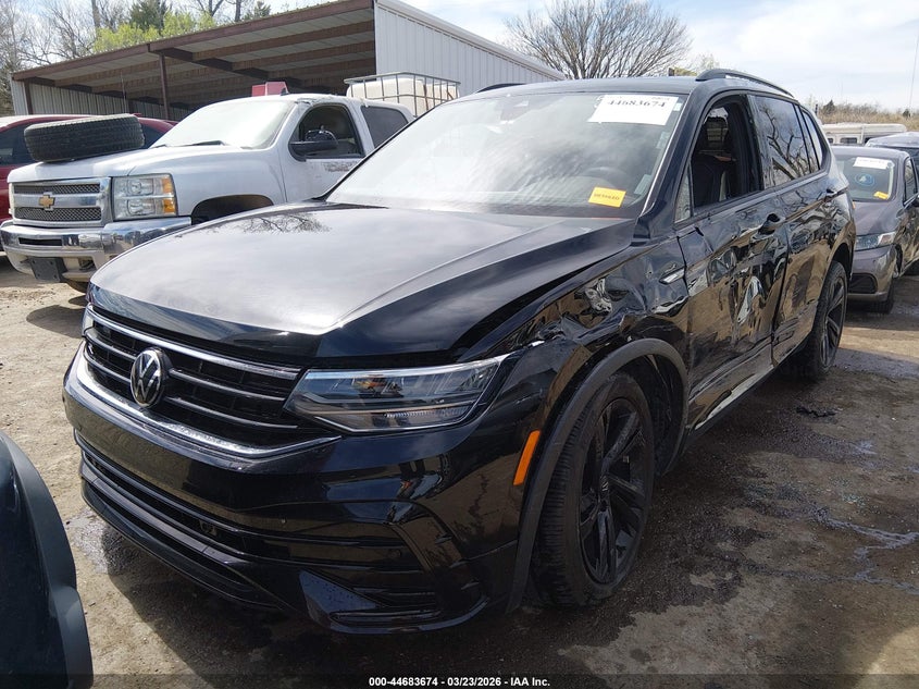 2023 Volkswagen Tiguan VIN 3VVCB7AX9PM115491 IAAI salvage auction — LEFT SIDE, Wait Title, sold $9,350 on 2026-08-20 (photo 2)