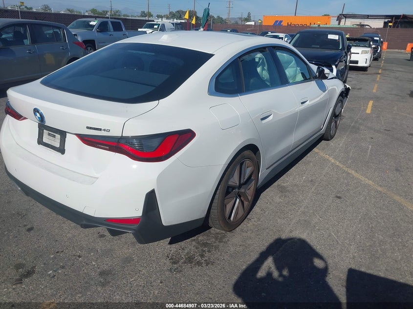 2023 BMW I4 VIN WBY73AW00PFR12409 IAAI salvage auction — LEFT FRONT, Wait Title, sold $8,600 on 2026-07-13 (photo 4)
