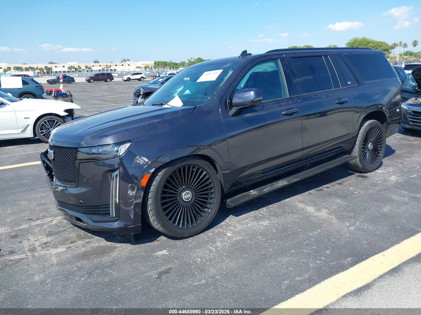 2023 Cadillac Escalade ESV VIN 1GYS3PKL2PR563390 IAAI salvage auction — Side, Rebuildable (Florida), sold $32,550 on 2026-05-18 (photo 2)