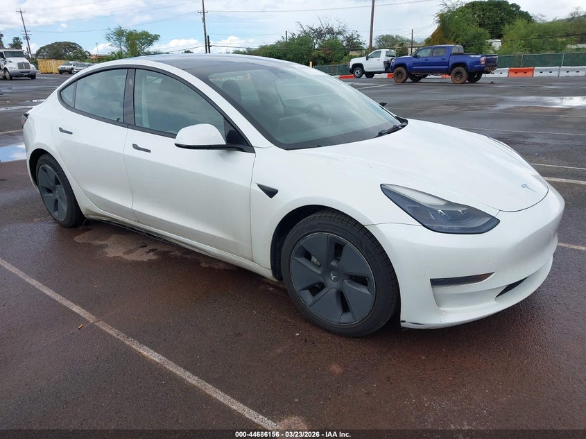 2023 Tesla Model 3 VIN 5YJ3E1EA4PF407661 IAAI salvage auction — SIDE, Salvage (Hawaii), sold $4,450 on 2026-07-28 (photo 1)