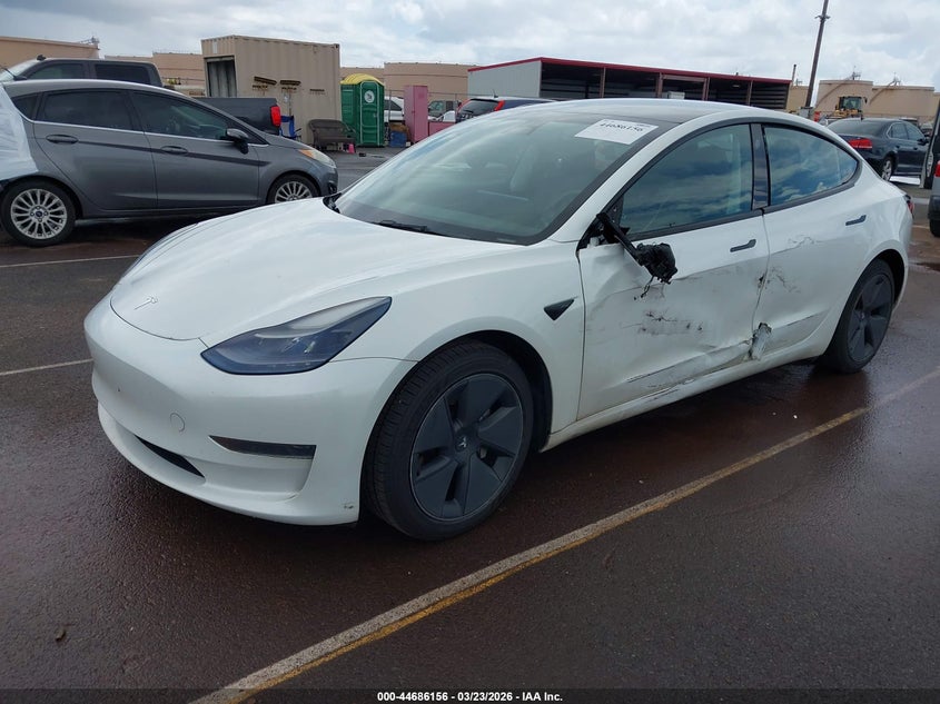 2023 Tesla Model 3 VIN 5YJ3E1EA4PF407661 IAAI salvage auction — SIDE, Salvage (Hawaii), sold $4,450 on 2026-07-28 (photo 2)