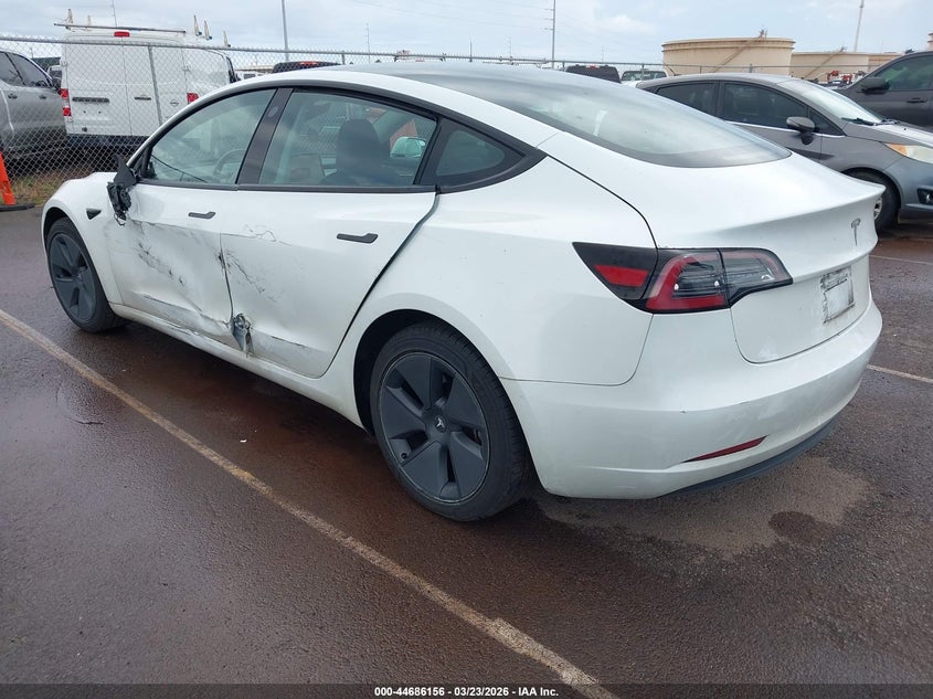 2023 Tesla Model 3 VIN 5YJ3E1EA4PF407661 IAAI salvage auction — SIDE, Salvage (Hawaii), sold $4,450 on 2026-07-28 (photo 3)