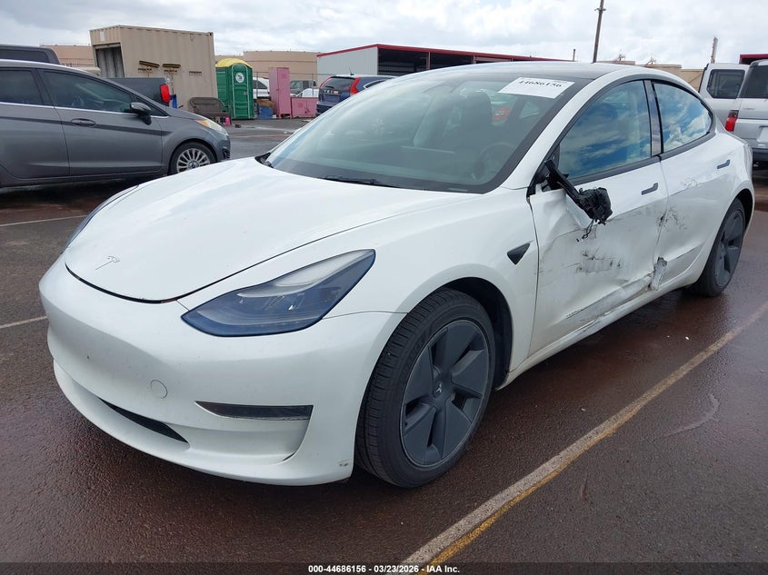 2023 Tesla Model 3 VIN 5YJ3E1EA4PF407661 IAAI salvage auction — SIDE, Salvage (Hawaii), sold $4,450 on 2026-07-28 (photo 6)