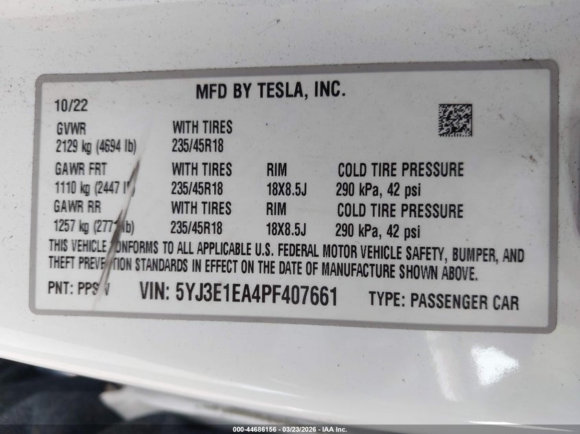 2023 Tesla Model 3 VIN 5YJ3E1EA4PF407661 IAAI salvage auction — SIDE, Salvage (Hawaii), sold $4,450 on 2026-07-28 (photo 9)