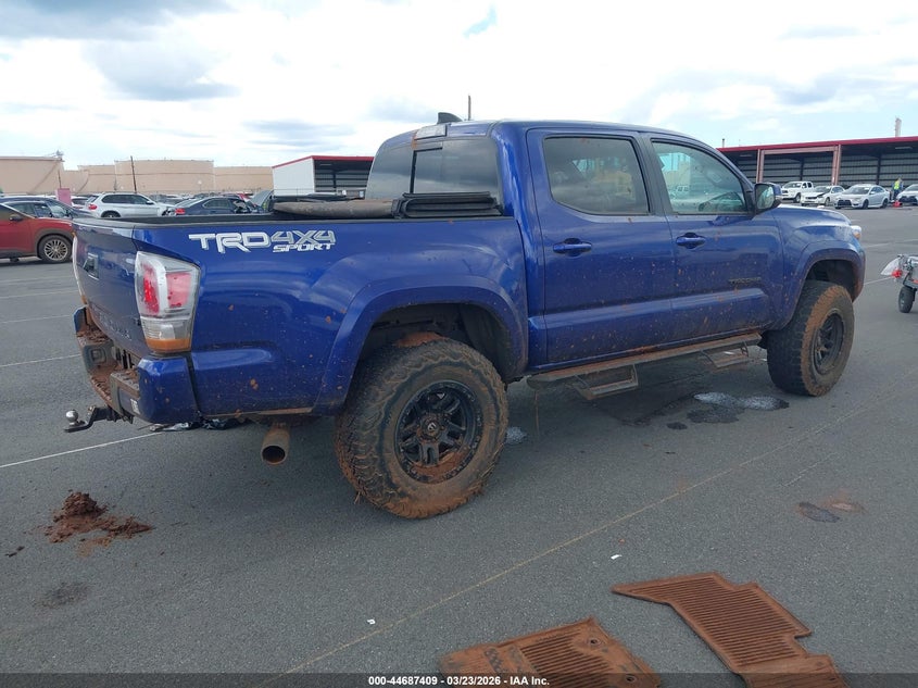 2023 Toyota Tacoma VIN 3TYCZ5AN5PT140678 IAAI salvage auction — WATER/FLOOD, Salvage (Hawaii), sold $7,825 on 2026-08-25 (photo 4)