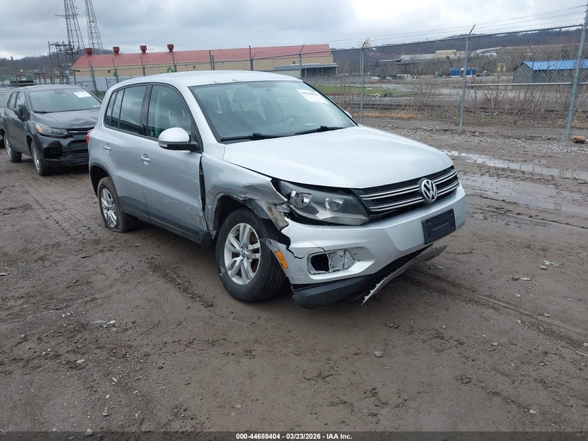 2014 Volkswagen Tiguan VIN WVGBV3AX5EW572186 IAAI salvage auction — SIDE, Salvage (Idaho), sold $450 on 2026-07-07 (photo 1)