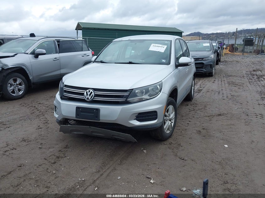 2014 Volkswagen Tiguan VIN WVGBV3AX5EW572186 IAAI salvage auction — SIDE, Salvage (Idaho), sold $450 on 2026-07-07 (photo 2)
