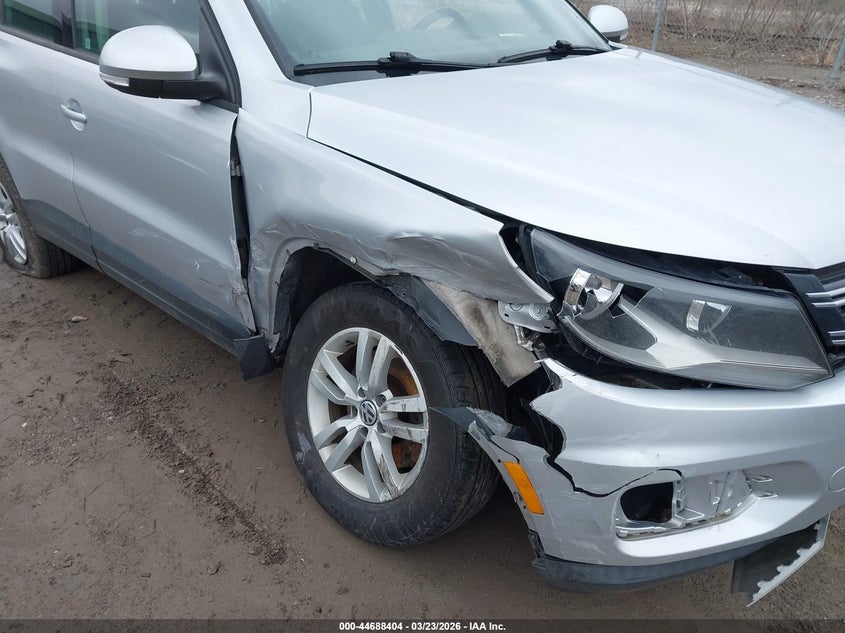 2014 Volkswagen Tiguan VIN WVGBV3AX5EW572186 IAAI salvage auction — SIDE, Salvage (Idaho), sold $450 on 2026-07-07 (photo 6)