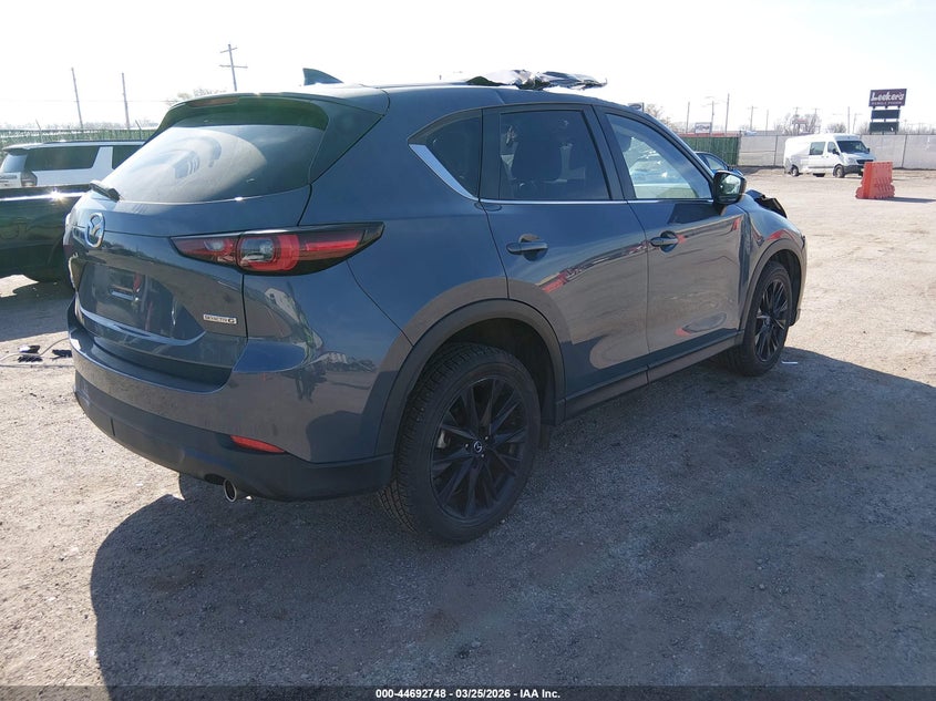 2023 Mazda Cx-5 VIN JM3KFBCM2P0138058 IAAI salvage auction — ROOF, Salvage (Kansas), sold $5,350 on 2026-07-10 (photo 4)
