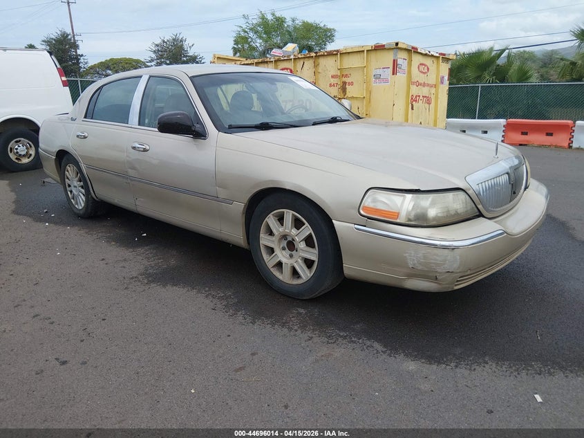 2010 Lincoln TOWN CAR VIN 2LNBL8CV0AX618861 IAAI salvage auction — WATER/FLOOD, Salvage (Hawaii), sold $50 on 2026-07-24 (photo 1)