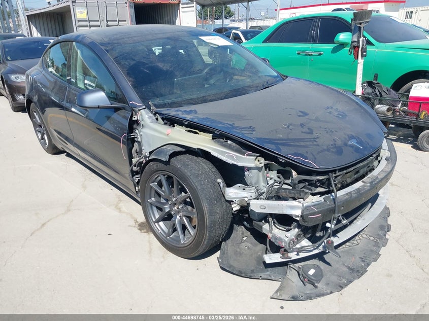 2022 Tesla Model 3 VIN 5YJ3E1EB0NF256761 IAAI salvage auction — FRONT END, Wait Title, sold $8,600 on 2026-07-08 (photo 1)