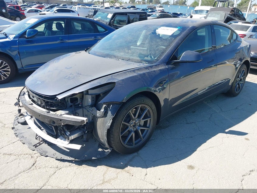 2022 Tesla Model 3 VIN 5YJ3E1EB0NF256761 IAAI salvage auction — FRONT END, Wait Title, sold $8,600 on 2026-07-08 (photo 2)