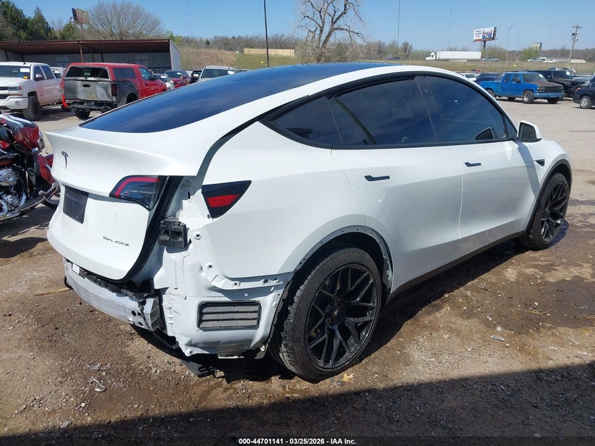 2023 Tesla Model y VIN 7SAYGDEE3PF706419 IAAI salvage auction — REAR END, Clear (Oklahoma), sold $12,600 on 2026-07-29 (photo 4)