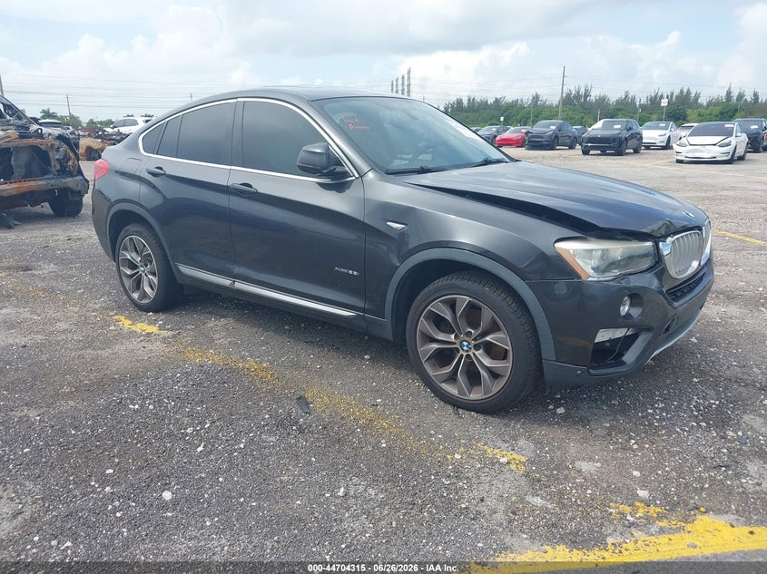 2016 BMW X4 VIN 5UXXW3C56G0M90233 IAAI salvage auction — RIGHT FRONT, Rebuildable (Florida), sold $4,150 on 2026-07-23 (photo 1)