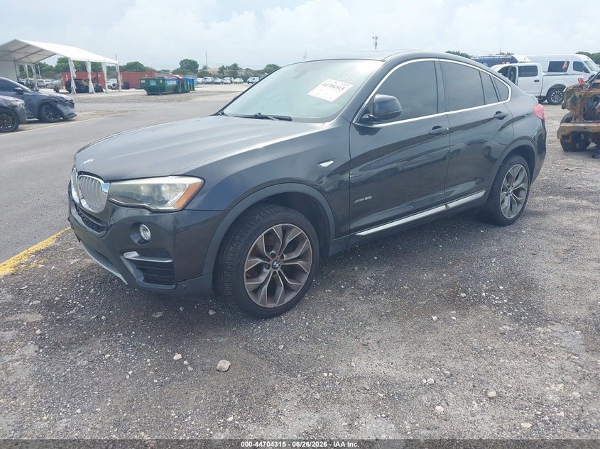 2016 BMW X4 VIN 5UXXW3C56G0M90233 IAAI salvage auction — RIGHT FRONT, Rebuildable (Florida), sold $4,150 on 2026-07-23 (photo 2)