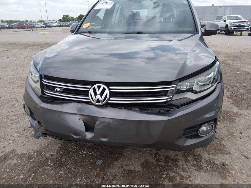 2014 Volkswagen Tiguan VIN WVGBV3AX1EW010480 IAAI salvage auction — FRONT END, Original (Texas), sold $825 on 2026-07-09 (photo 6)