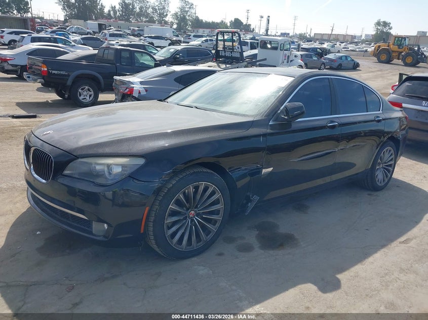 2011 BMW 7er VIN WBAKA4C5XBC613150 IAAI salvage auction — LEFT SIDE, Salvage (California), sold $1,850 on 2026-07-15 (photo 2)