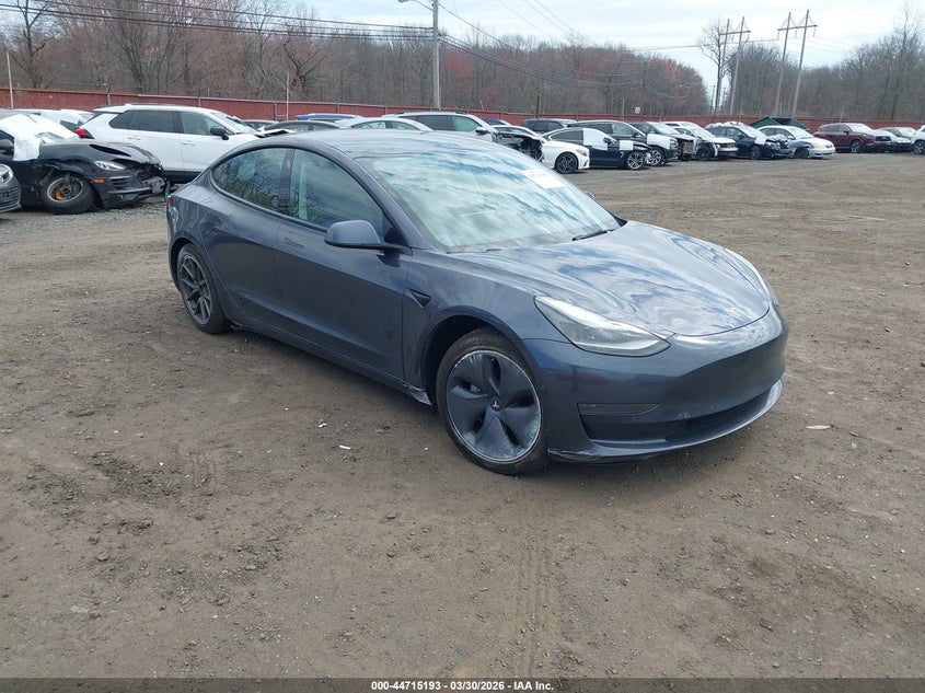2022 Tesla Model 3 VIN 5YJ3E1EAXNF111993 IAAI salvage auction — SIDE, Salvage (Idaho), sold $7,100 on 2026-07-15 (photo 1)