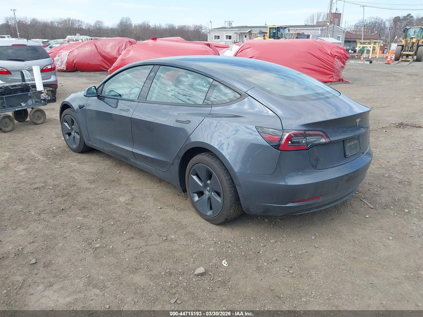 2022 Tesla Model 3 VIN 5YJ3E1EAXNF111993 IAAI salvage auction — SIDE, Salvage (Idaho), sold $7,100 on 2026-07-15 (photo 3)