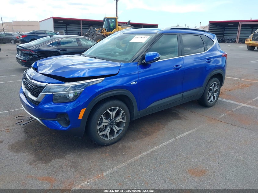 2023 Kia Seltos VIN KNDERCAA8P7404041 IAAI salvage auction — FRONT & REAR, Salvage (Hawaii), sold $2,350 on 2026-07-21 (photo 2)