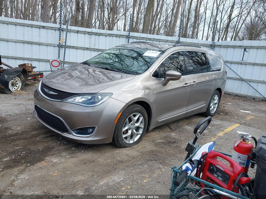 2017 Chrysler Pacifica VIN 2C4RC1BG1HR660452 IAAI salvage auction — LEFT SIDE, Clear (Michigan), sold $3,400 on 2026-08-01 (photo 2)