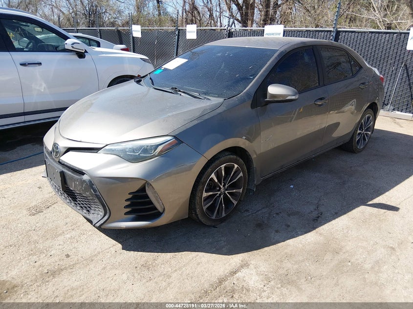 2018 Toyota Corolla VIN 5YFBURHE3JP825796 IAAI salvage auction — LEFT SIDE, Wait Title, sold $50 on 2026-07-29 (photo 2)