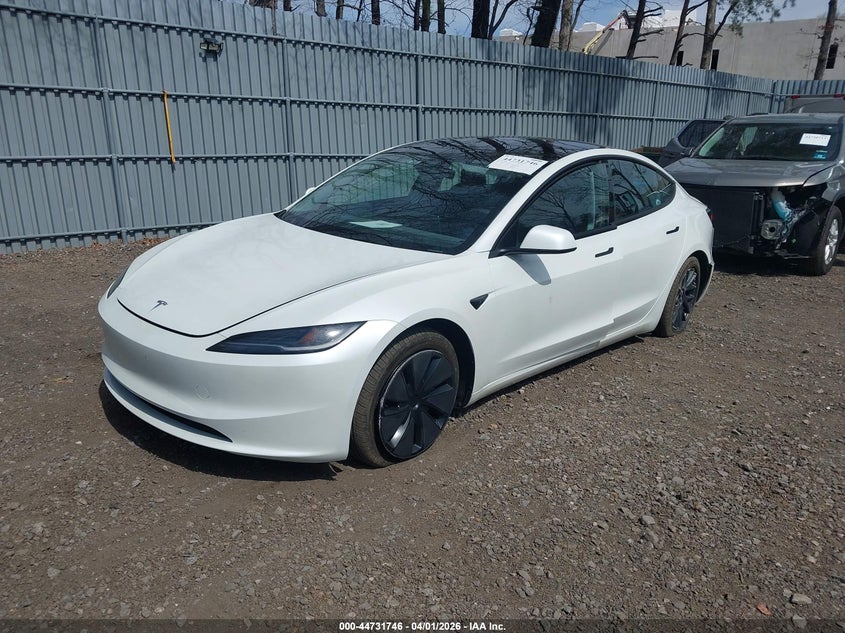 2025 Tesla Model 3 VIN 5YJ3E1EA8SF978479 IAAI salvage auction — SIDE, Salvage (New Jersey), sold $10,100 on 2026-07-29 (photo 2)