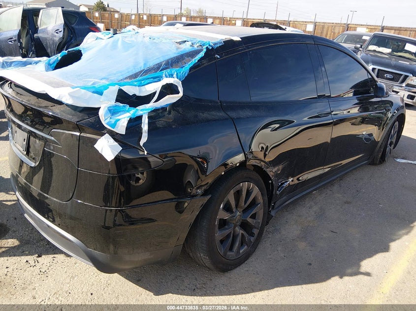 2024 Tesla Model x VIN 7SAXCAE50RF452435 IAAI salvage auction — SUSPENSION, Salvage (Colorado), sold $19,750 on 2026-07-09 (photo 4)