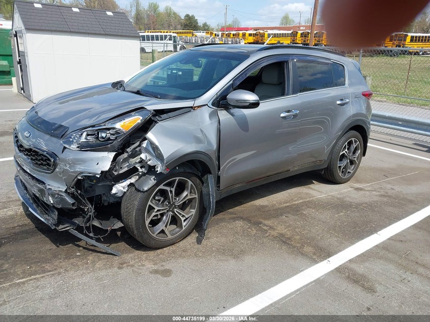 2020 Kia Sportage VIN KNDPR3A69L7713788 IAAI salvage auction — LEFT FRONT, Salvage Title, sold $4,450 on 2026-08-01 (photo 2)