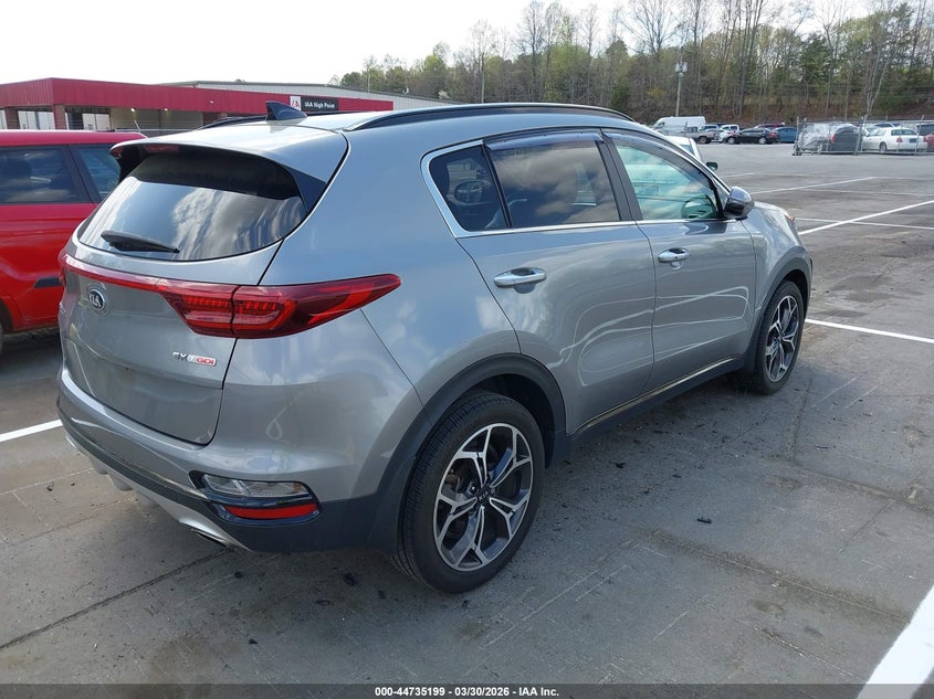 2020 Kia Sportage VIN KNDPR3A69L7713788 IAAI salvage auction — LEFT FRONT, Salvage Title, sold $4,450 on 2026-08-01 (photo 4)