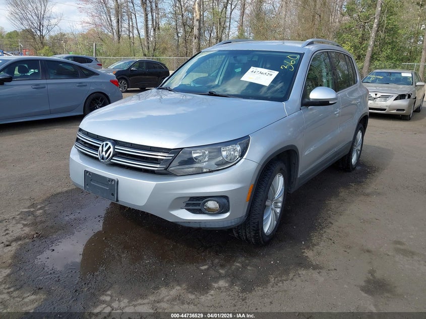2012 Volkswagen Tiguan VIN WVGBV7AX5CW608320 IAAI salvage auction — RIGHT FRONT, Salvage (Delaware), sold $800 on 2026-08-05 (photo 2)