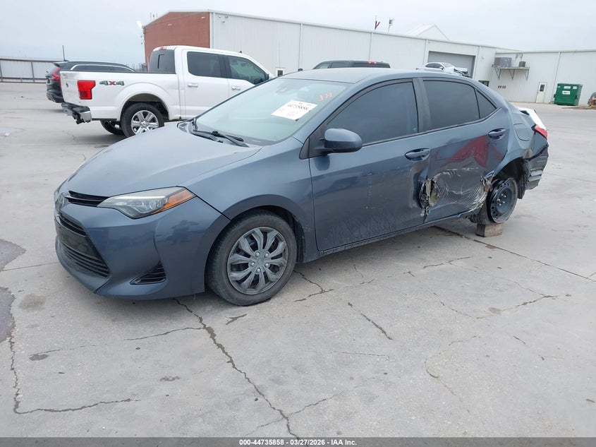2017 Toyota Corolla VIN 5YFBURHE9HP666857 IAAI salvage auction — LEFT SIDE, Original (Texas), sold $2,650 on 2026-07-08 (photo 2)