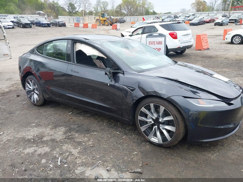2025 Tesla Model 3 VIN 5YJ3E1EB5SF897979 IAAI salvage auction — ROLLOVER, Wait Title, sold $7,975 on 2026-07-08 (photo 1)