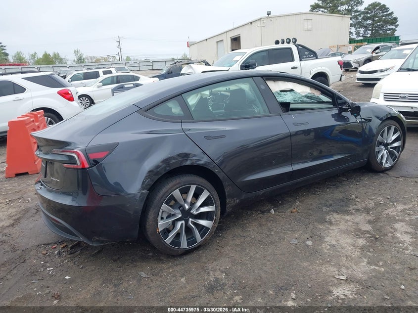 2025 Tesla Model 3 VIN 5YJ3E1EB5SF897979 IAAI salvage auction — ROLLOVER, Wait Title, sold $7,975 on 2026-07-08 (photo 4)