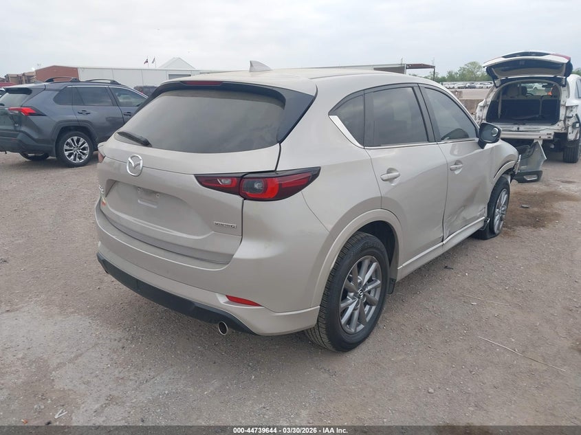 2025 Mazda Cx-5 VIN JM3KFBCL9S0615309 IAAI salvage auction — SIDE, Wait Title, sold $9,600 on 2026-07-09 (photo 4)
